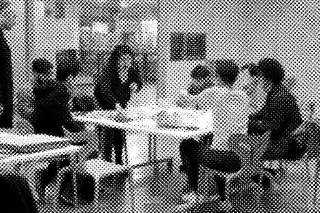 Group of people at table during workshop