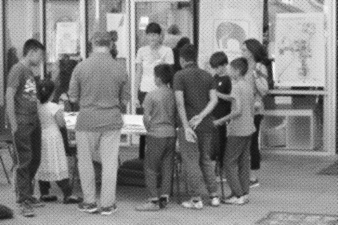 Photograph of group of people standing at workshop